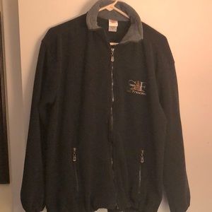 This is a soft polyester jacket for every day wear- zipper close .